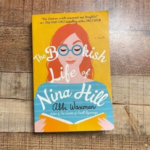 The Bookish Life of Nina Hill by - Vibrant Yellow and Blue Cover